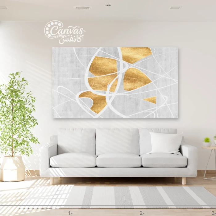 لوحة تجريدية بتفاصيل ذهبية على خلفية بيضاء
